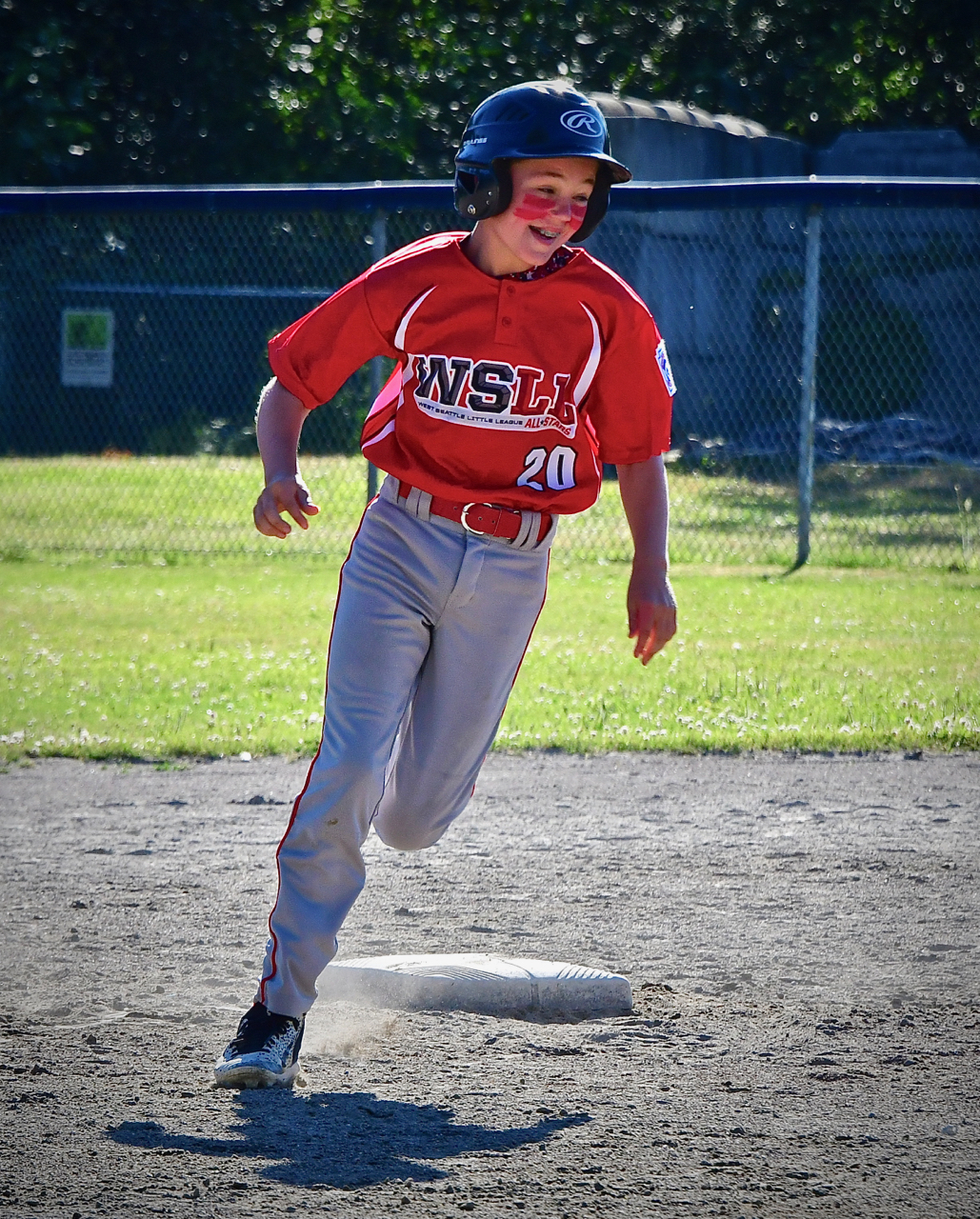 Happy home run hitter. Photo by Patrick Robinson