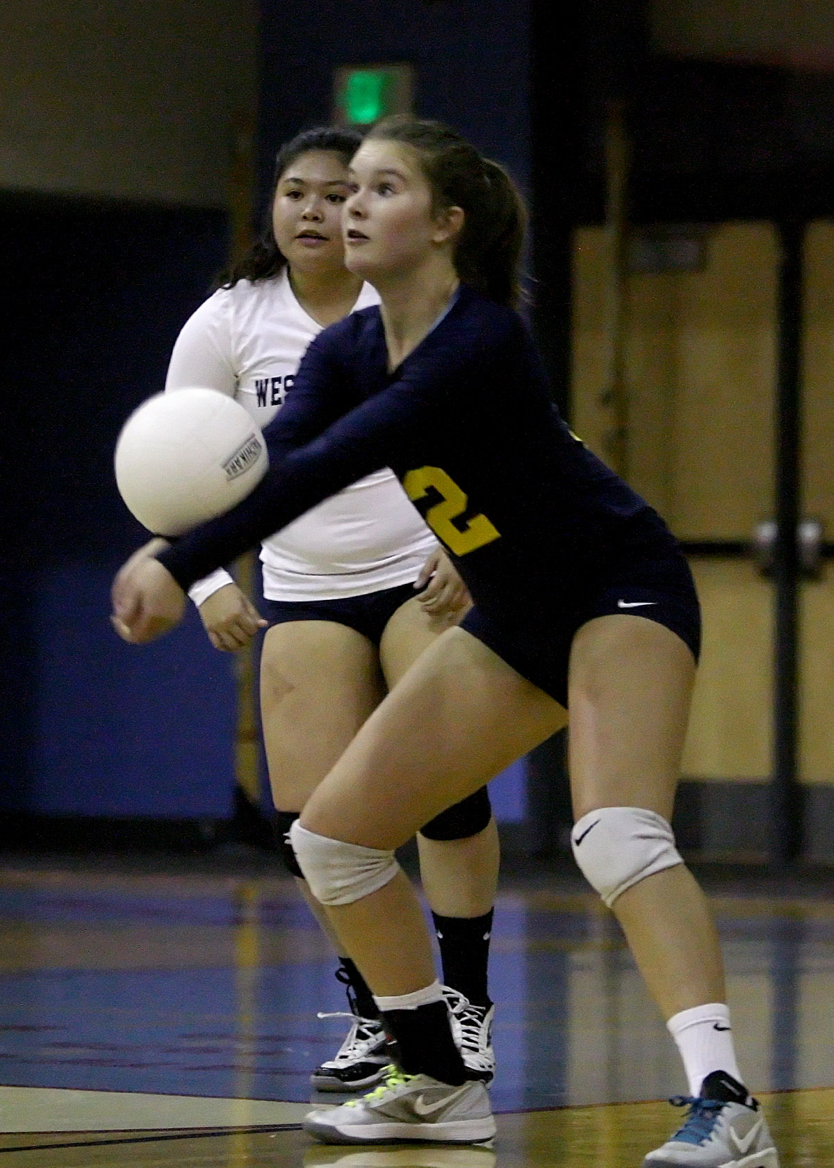 Ellie Strauss of West Seattle returns the ball.