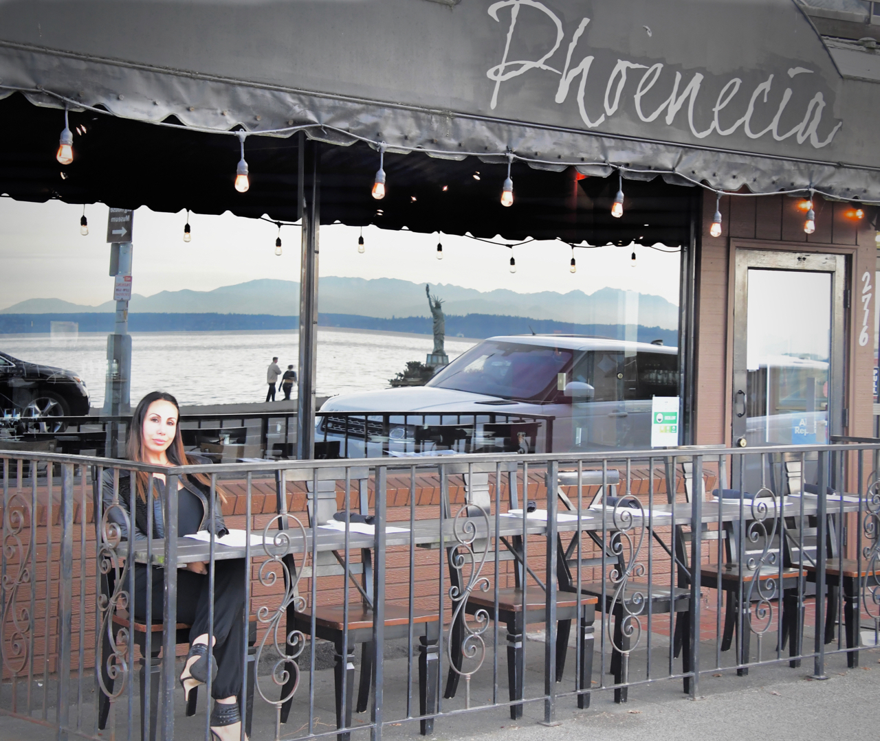 Sonya Khazaal in front of her family's restaurant The Phoenecia on Alki Beach. Photo by Patrick Robinson