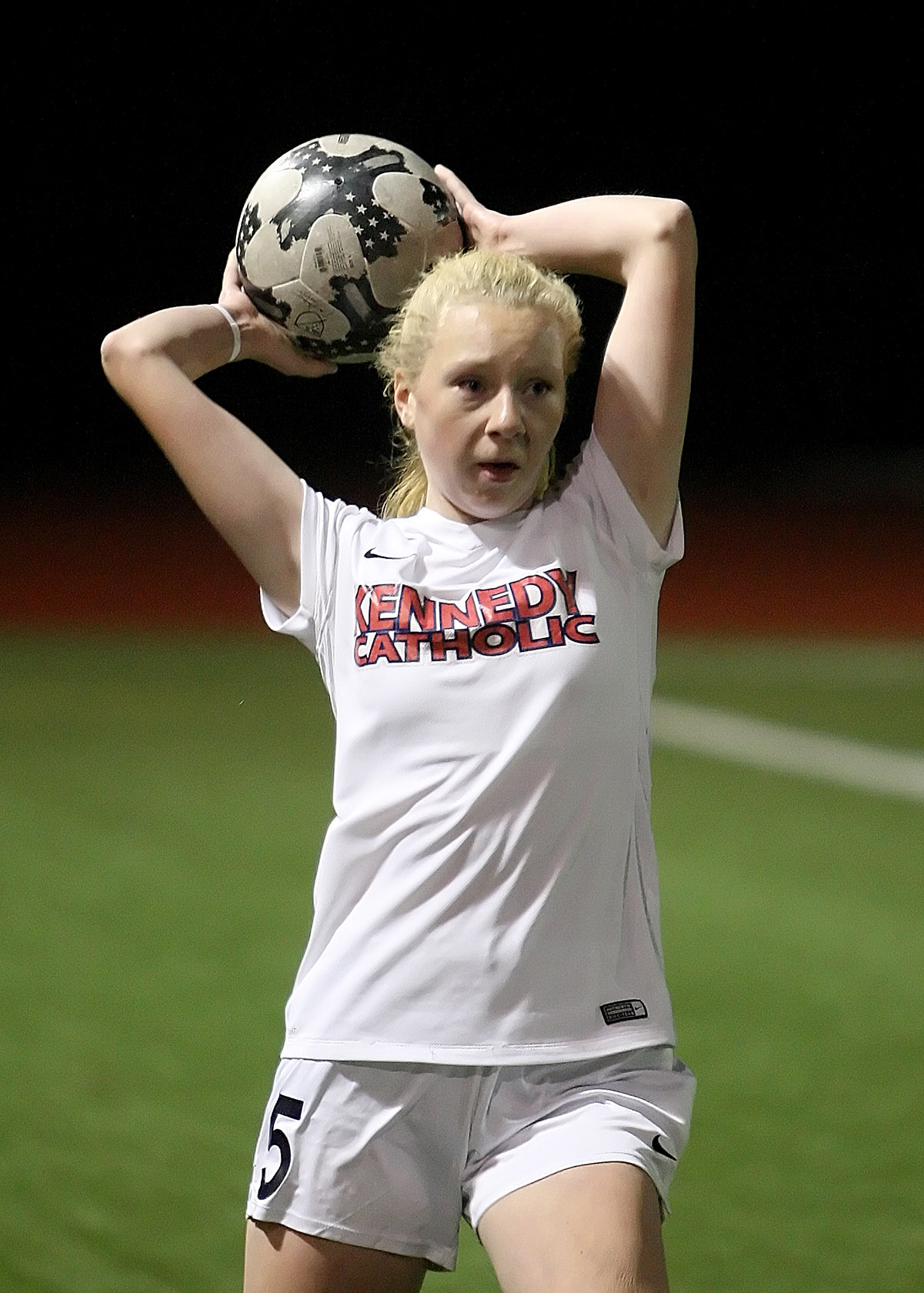 Cassidy Elicker of Kennedy Catholic throws the ball in from the sidelines.