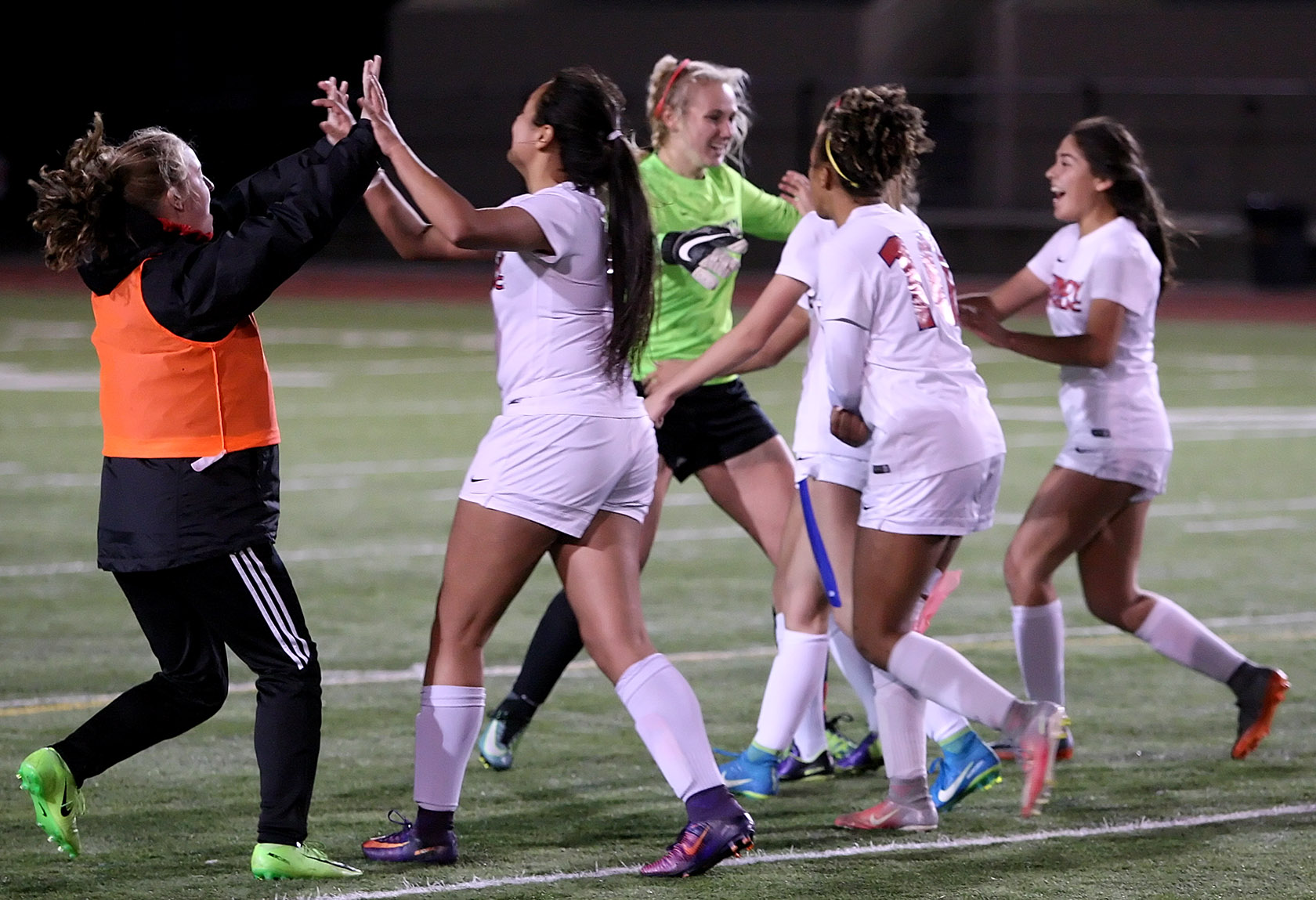 Kennedy Catholic is all smile as they enjoy their playoff win.