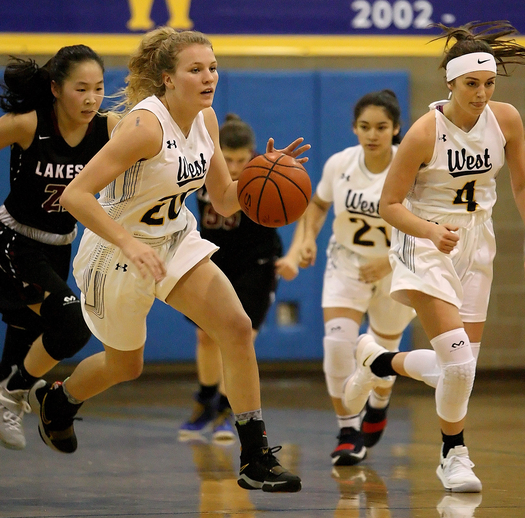 Grace Sarver of West Seattle dribbles the ball up on a fast break.