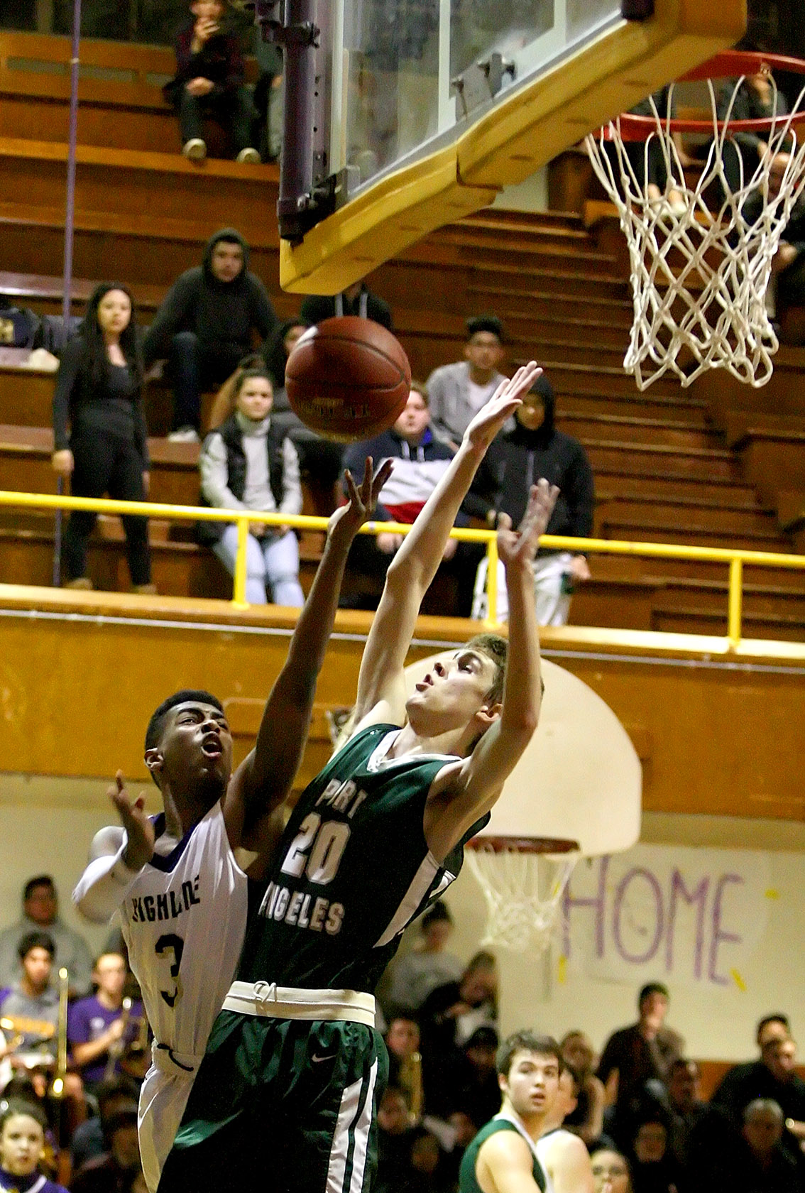 Sam Assefa of Highline puts up a shot against Port Angeles Payton Schmidt.