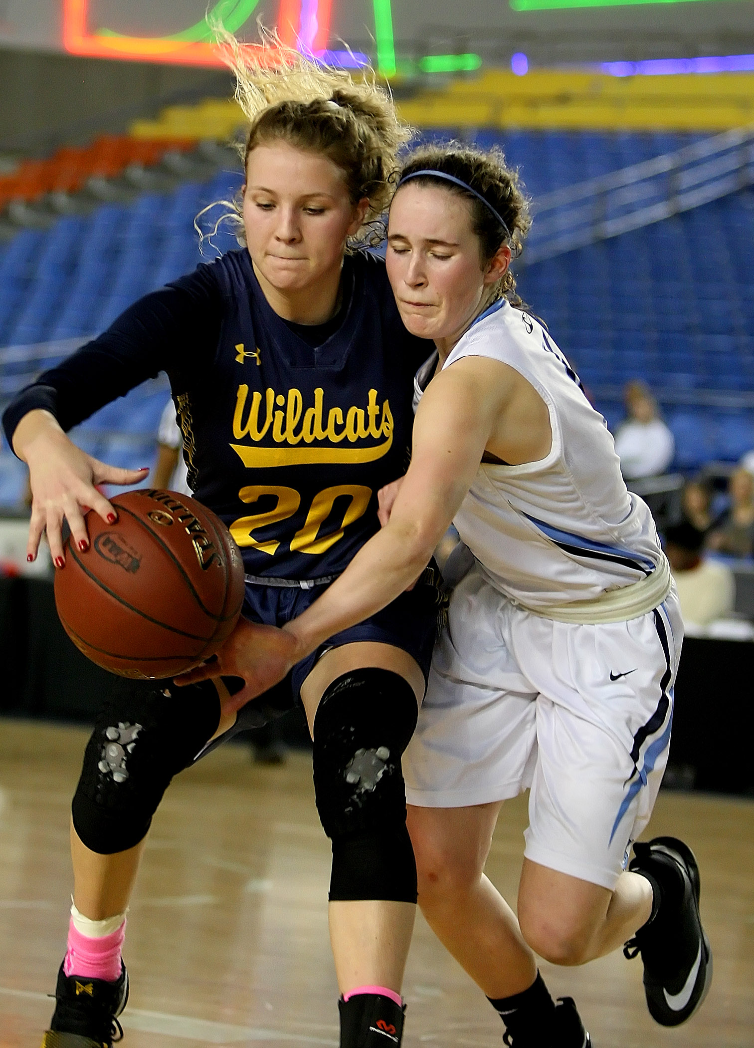 Grace Sarver of West Seattle and Gig Harbors Anna Stewart reach for a loose ball.