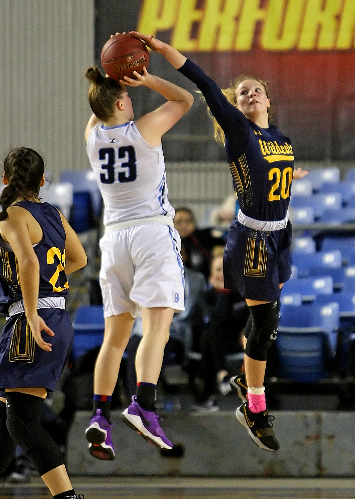 Grace Sarver of West Seattle blocks a shot by Gig Harbors Maddie Willett.