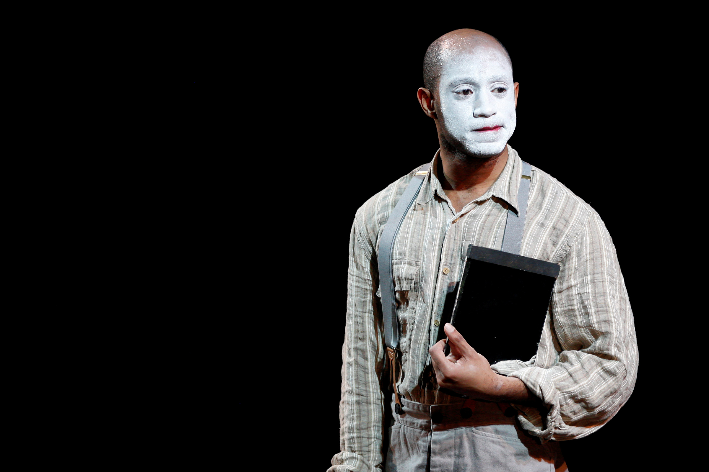 Actor Lamar Legend plays playwright B J J, who then dons white face and stars as George. 