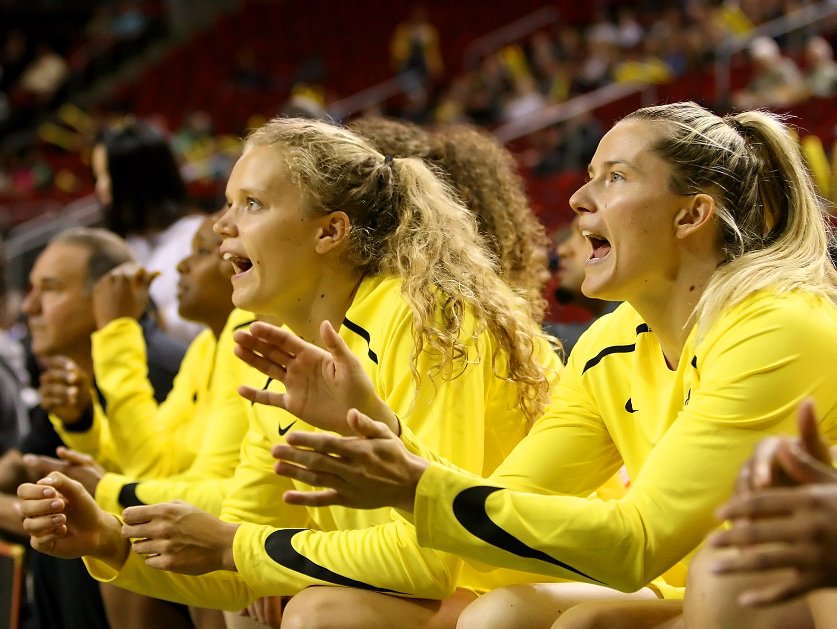 Brittany McPhee and Sami Whitcomb of the Storm celebrate a team basket.