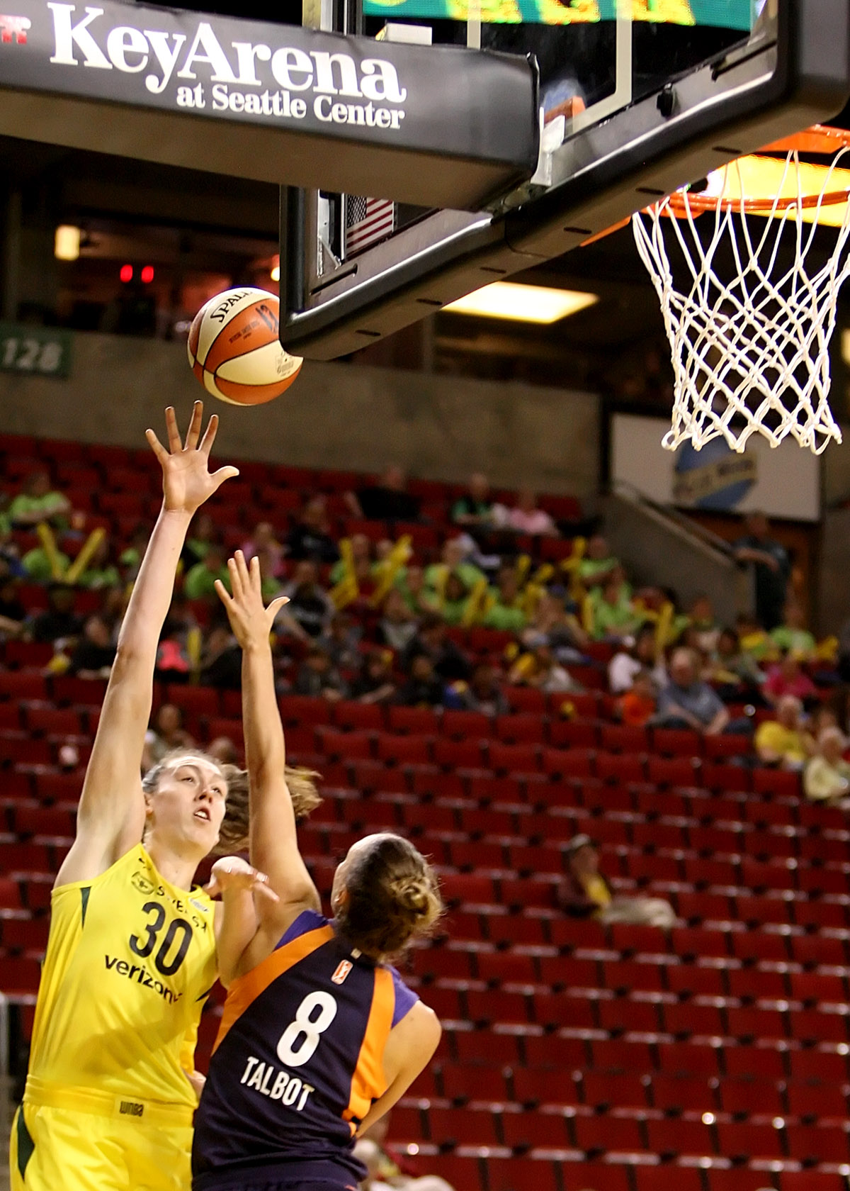 Breanna Stewart of the Storm puts up a shot against the Mercury's Stephanie Talbot.