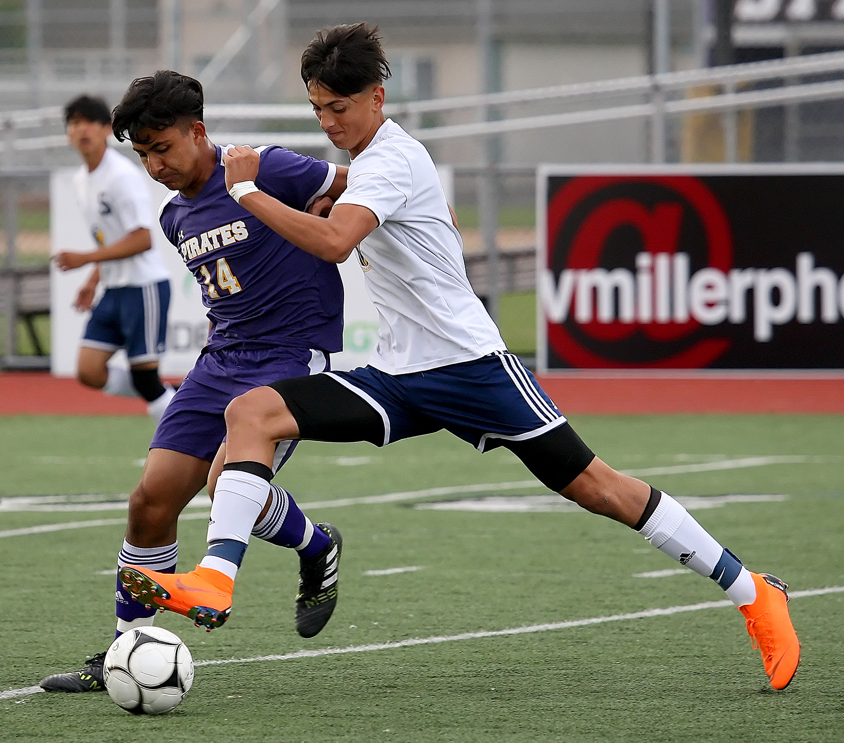 Emmanuel Cruz of Highline and Burlington Edisons Cameron Orestad go for the ball.