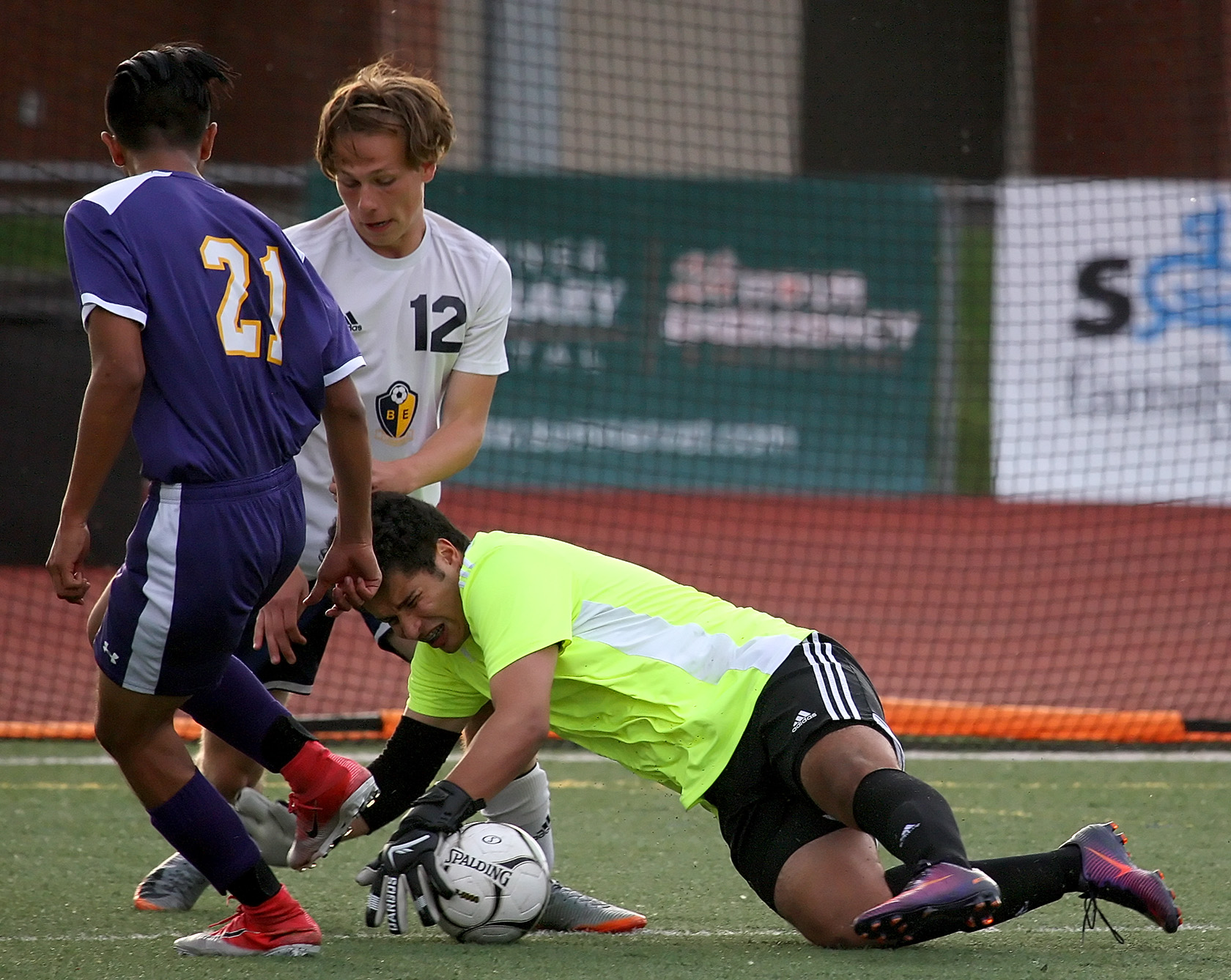  Goal keeper Maikol Alvarado of Highline grabs the ball in front of his goal.