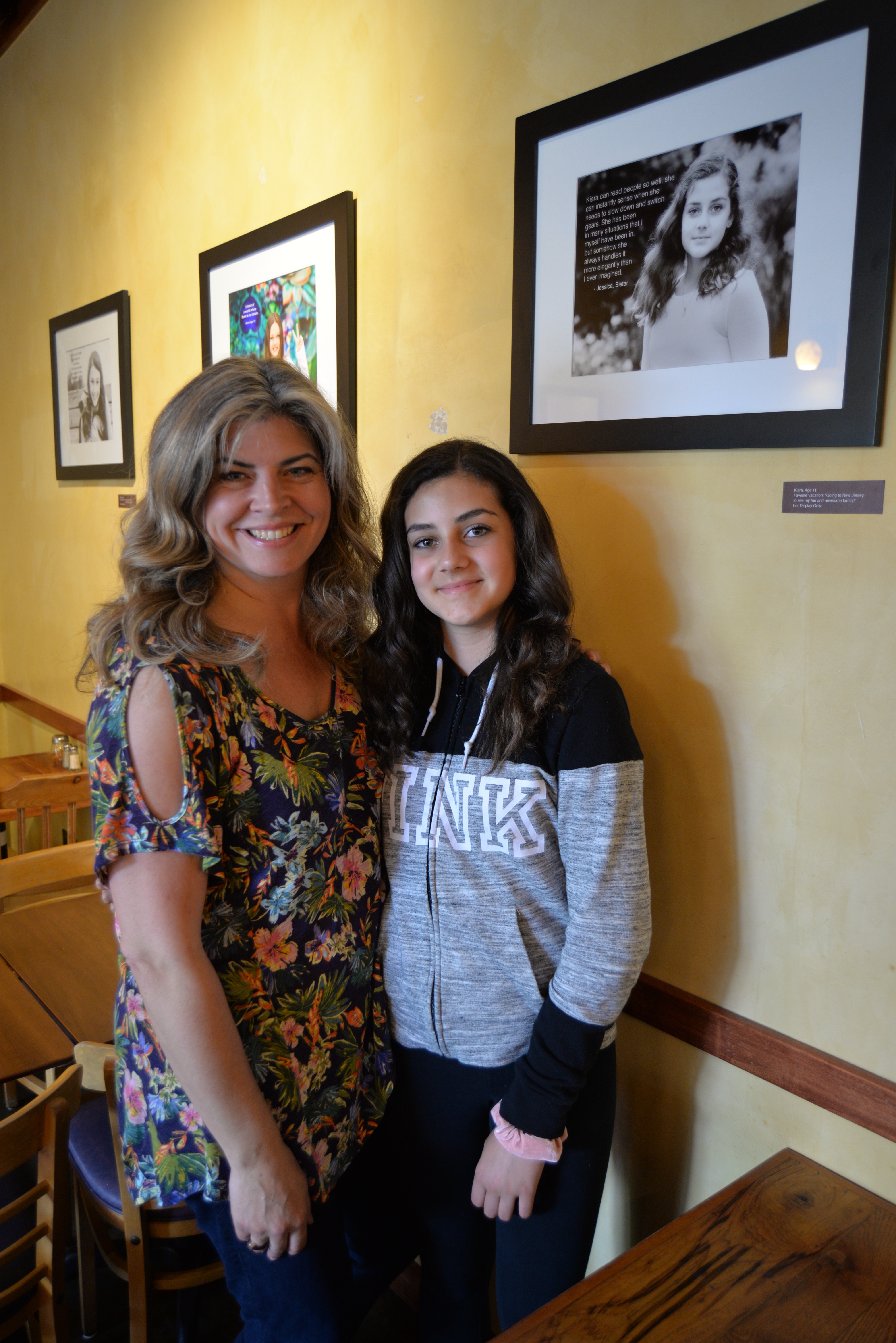 Photographer Linda Brooks with one of her subject’s West Seattle resident Kiara Bartel.