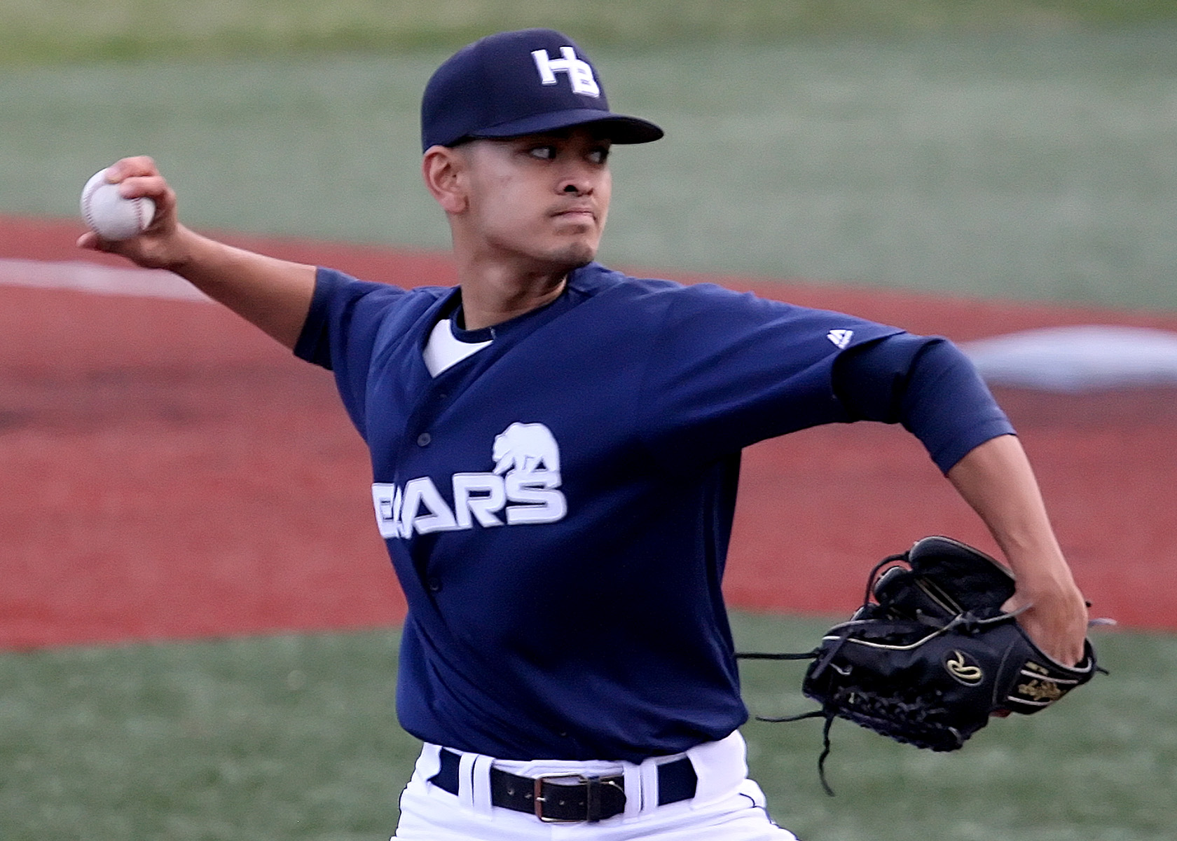 Bears starting pitcher JJ Asinas delivers the ball to home plate.