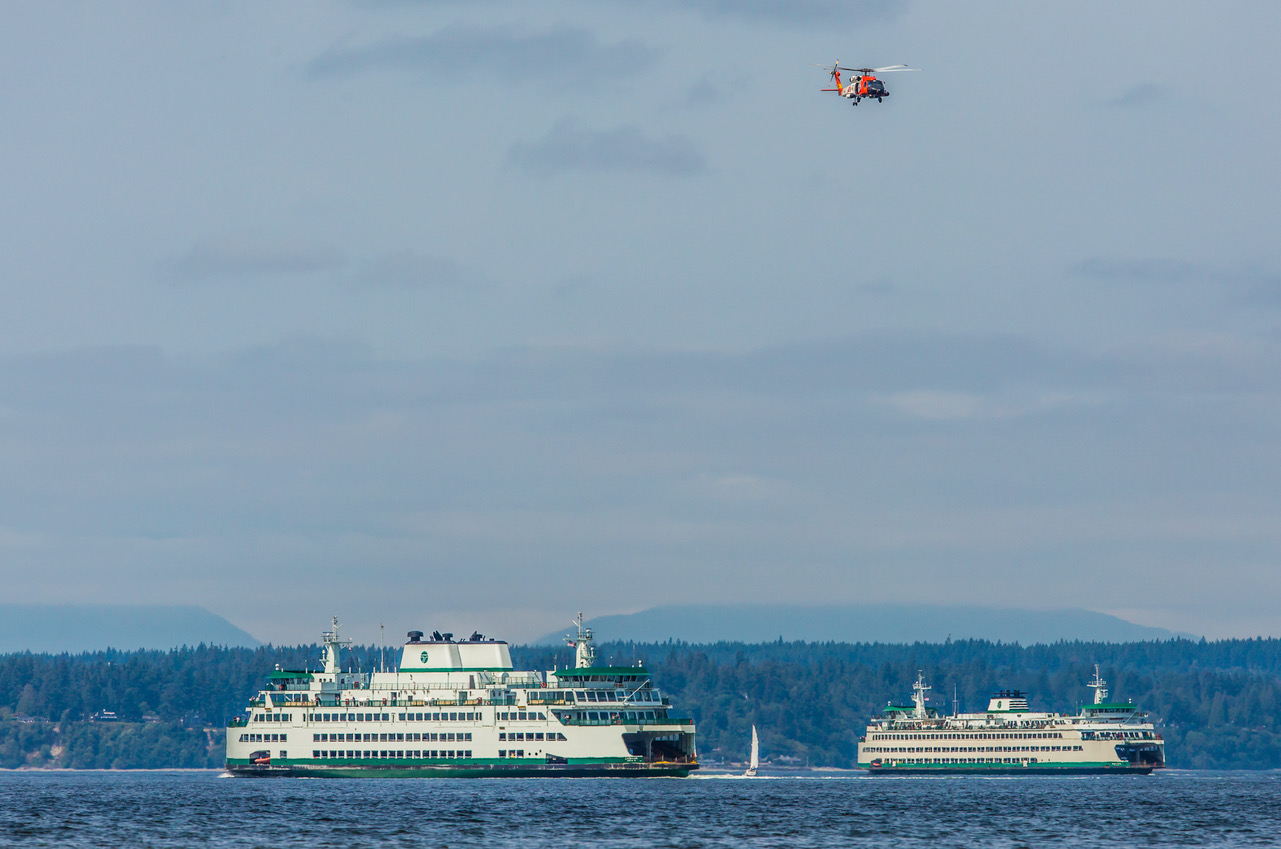 Ferries and coast guard helicopter