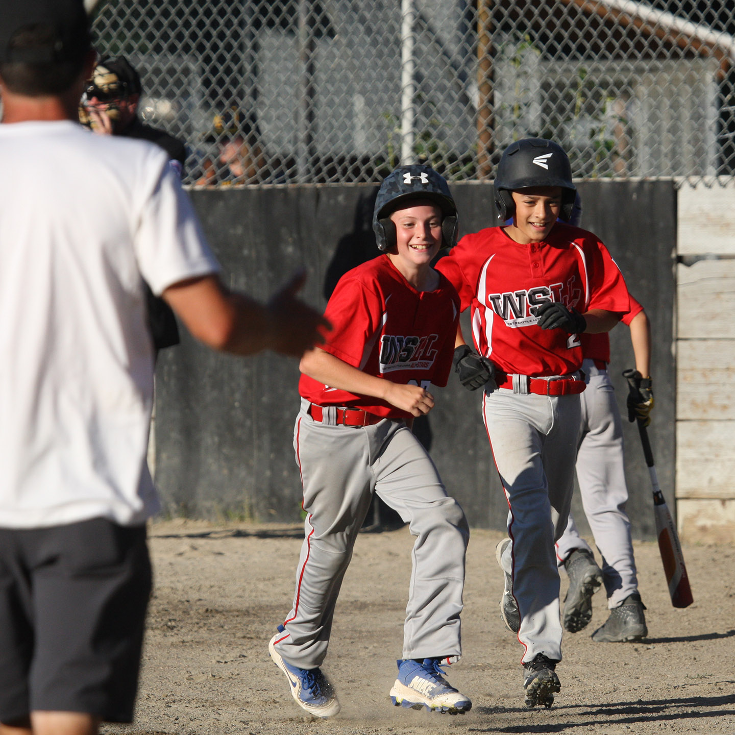 Cody Sazama and Hudson Harding of West Seattle are all smiles after they both scored.