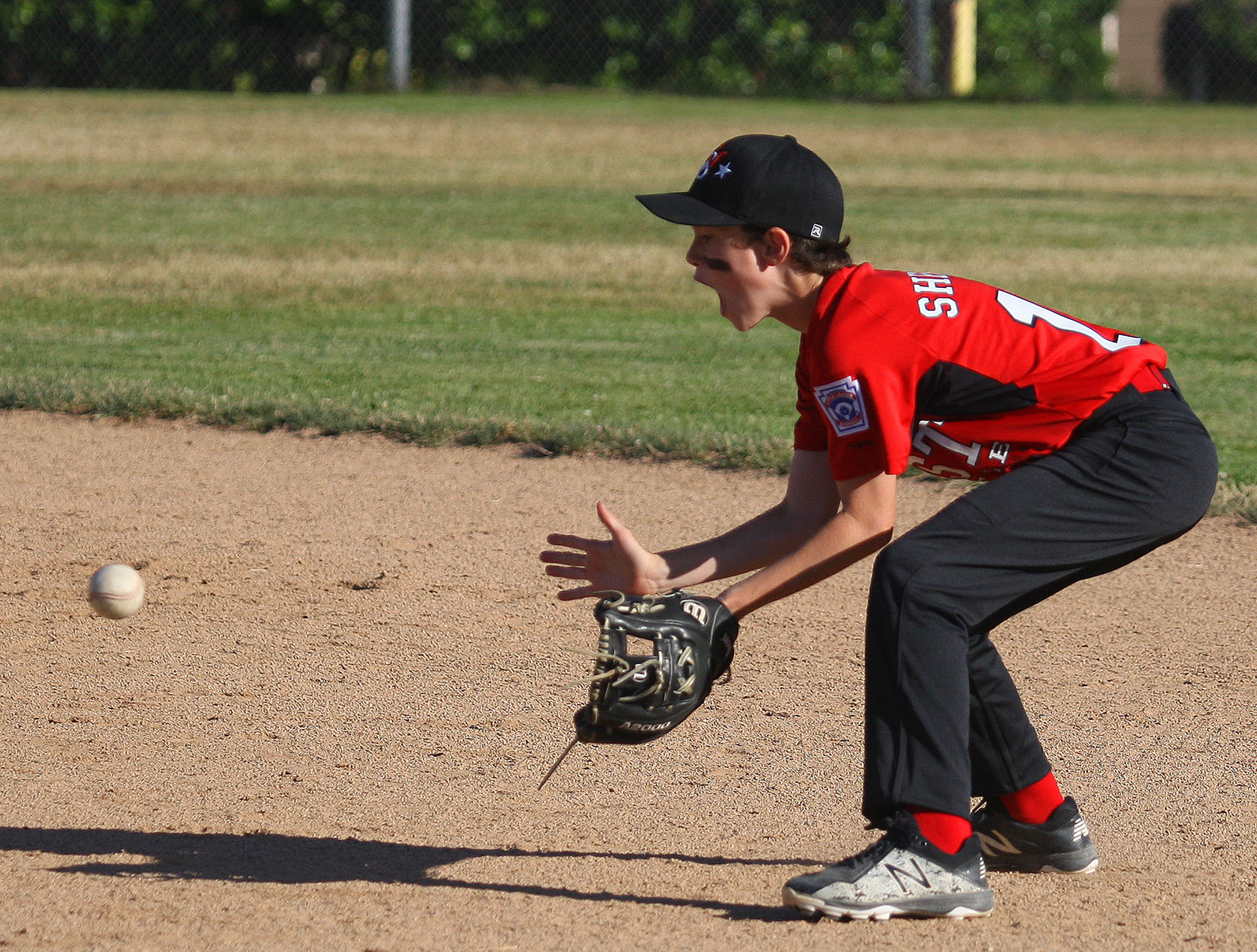 Second baseman Joe Sherick of West Seattle waits for a ground ball.