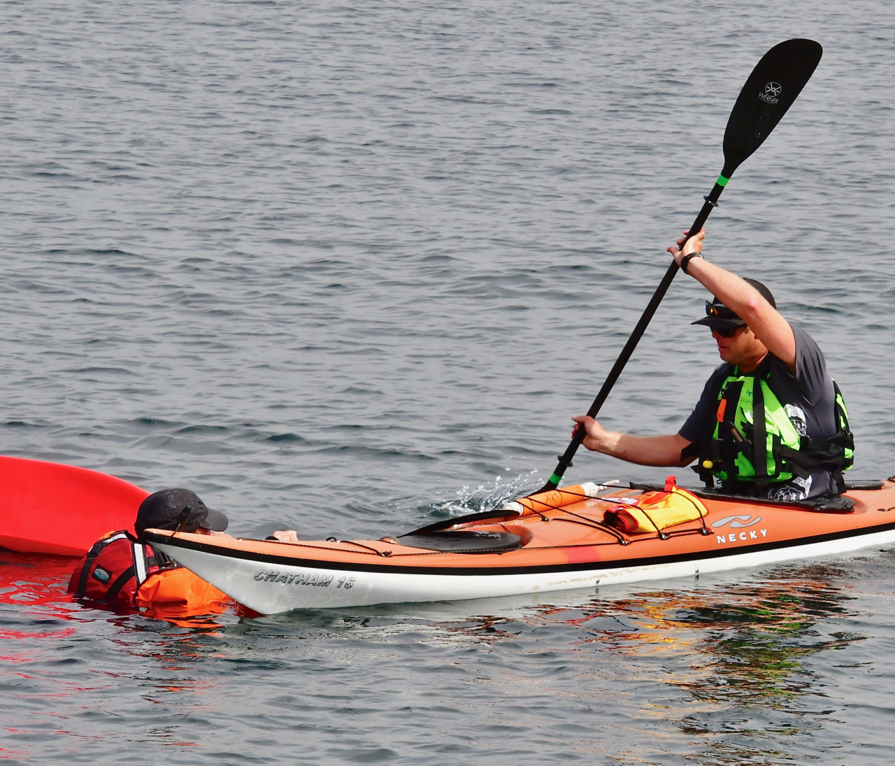 grabbing the other kayak