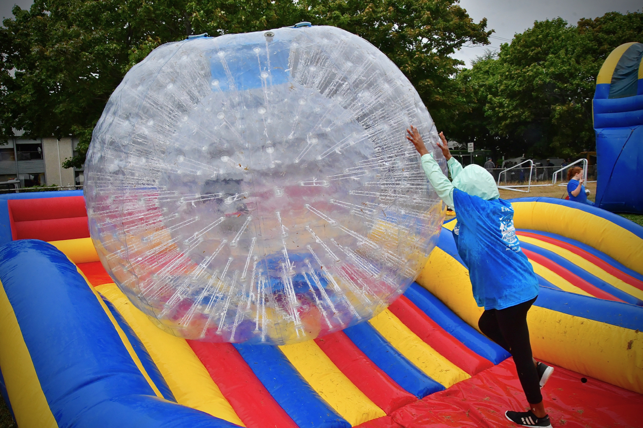 Big inflatable balls with kids inside were part of the fun. Photo by Patrick Robinson