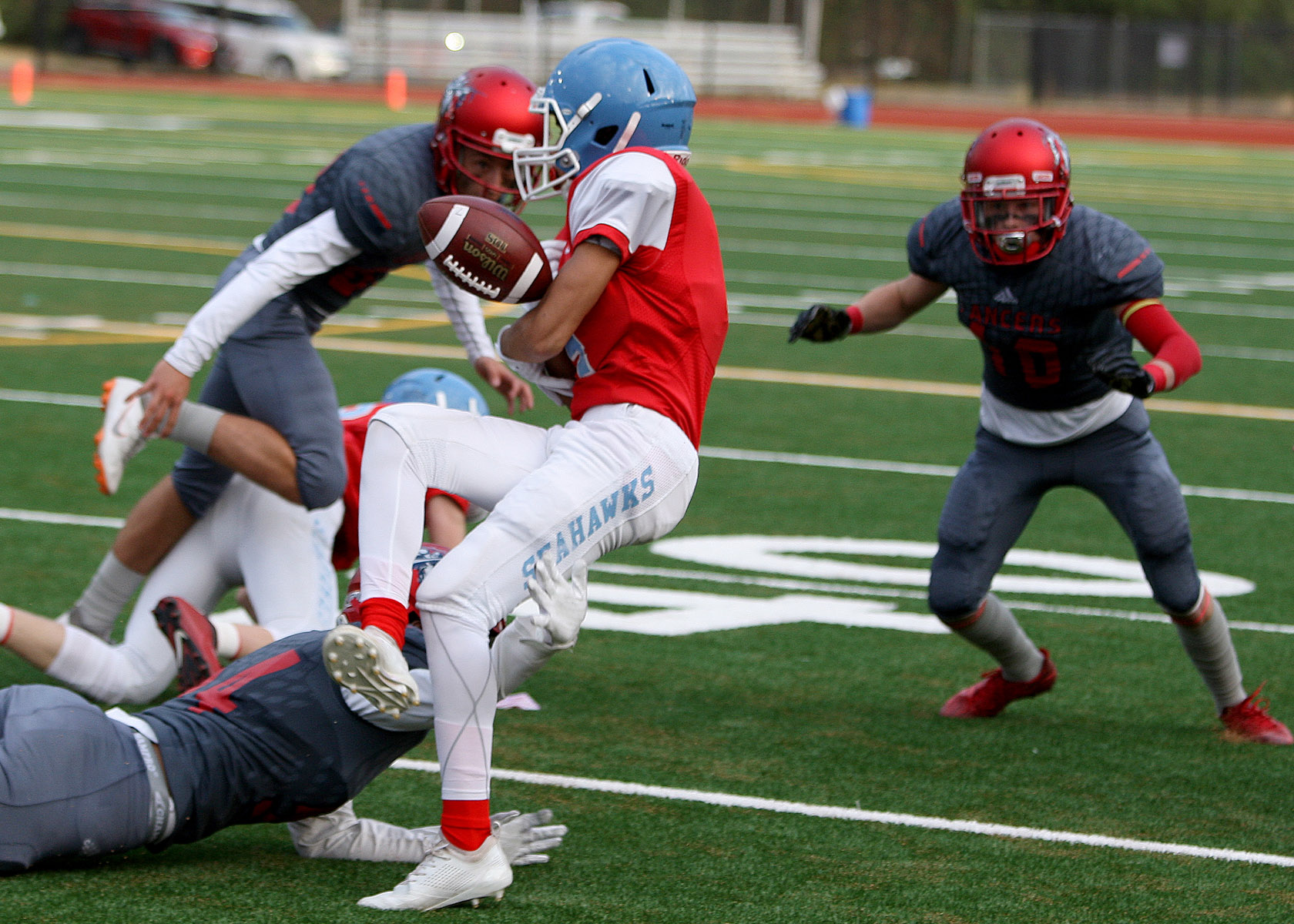 Quinn Killham of Chief Sealth fumbles the ball on the opening kickoff but Chief Sealth recovers the ball.