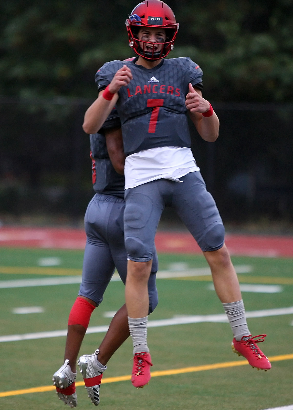 Quarterback Sam Huard of Kennedy celebrates after throwing a touchdown pass.