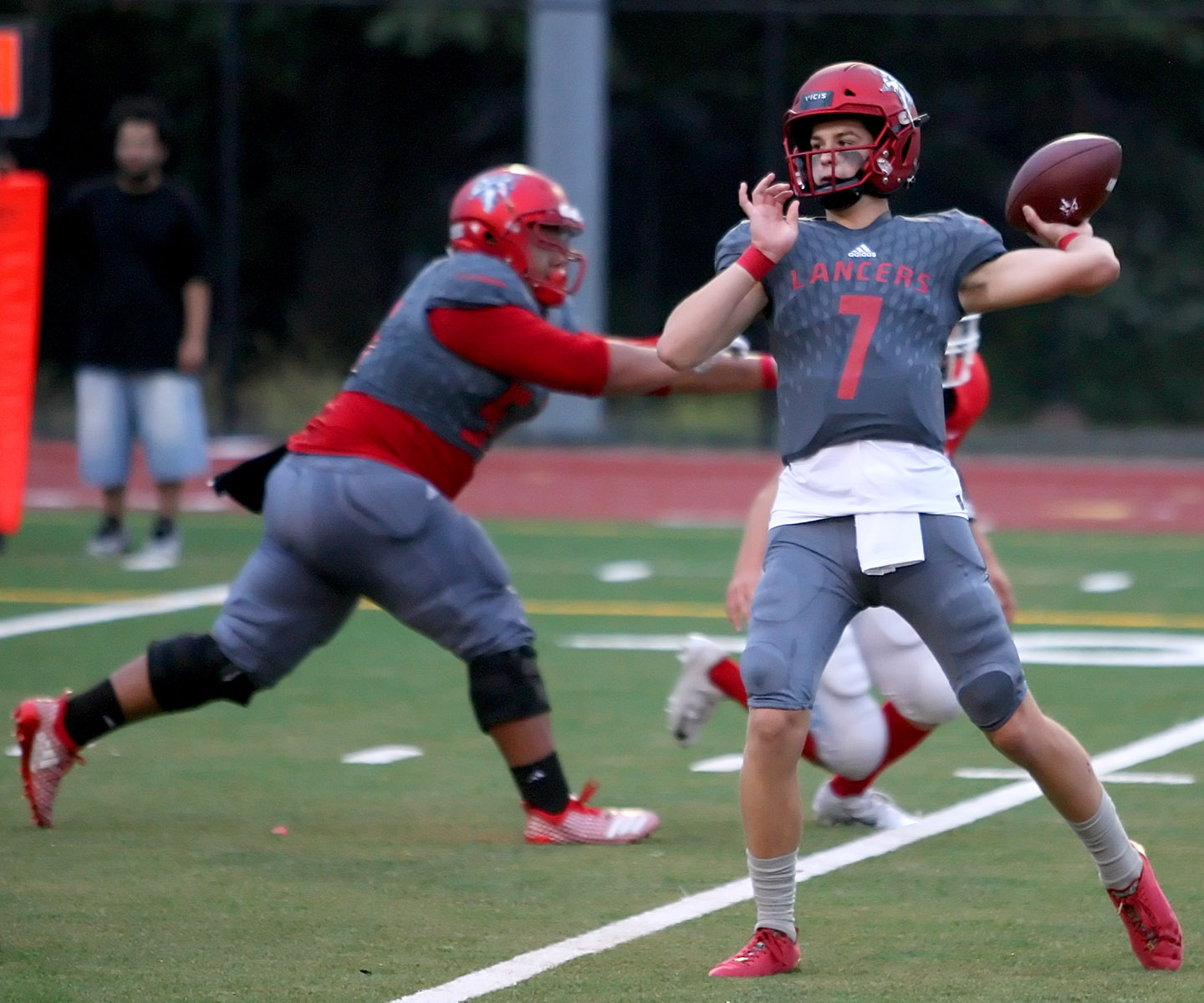 Quarterback Sam Huard of Kennedy passes the ball.