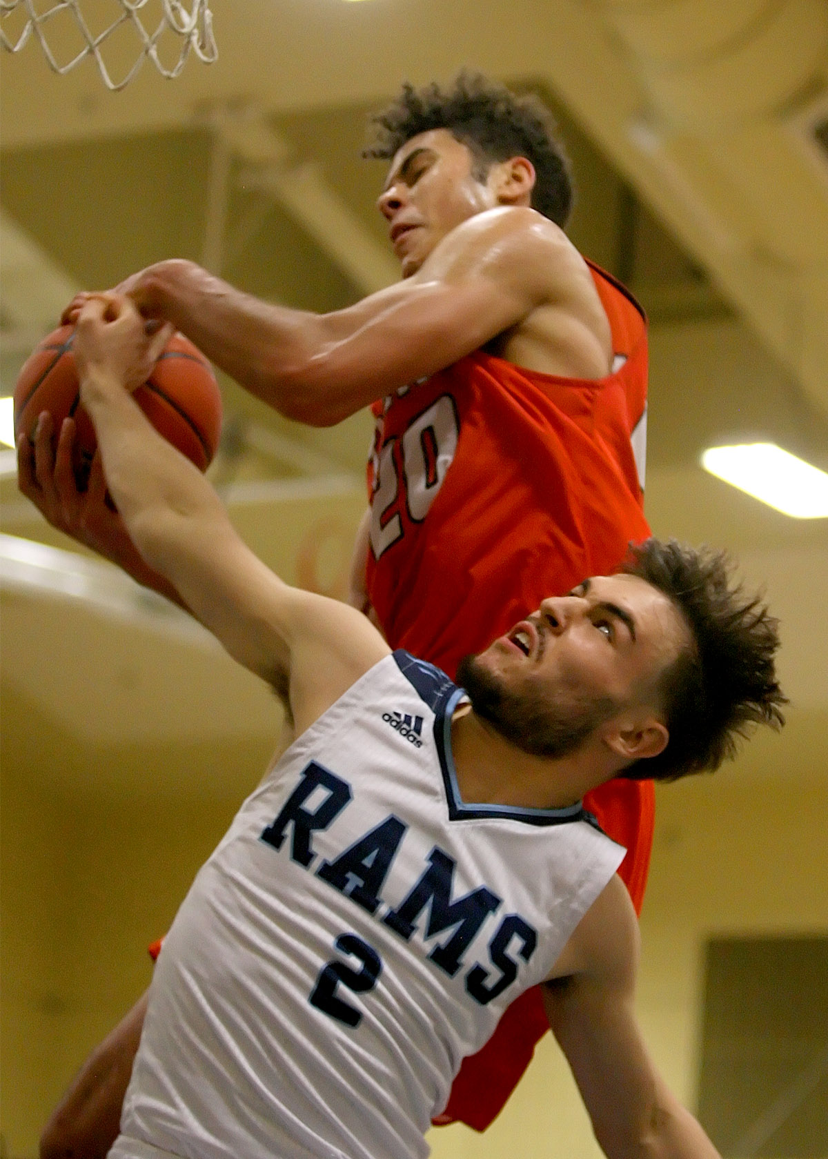 Vincent Orsillo of Mt Rainier reaches back for the ball against Battle Ground's Kaden Perry