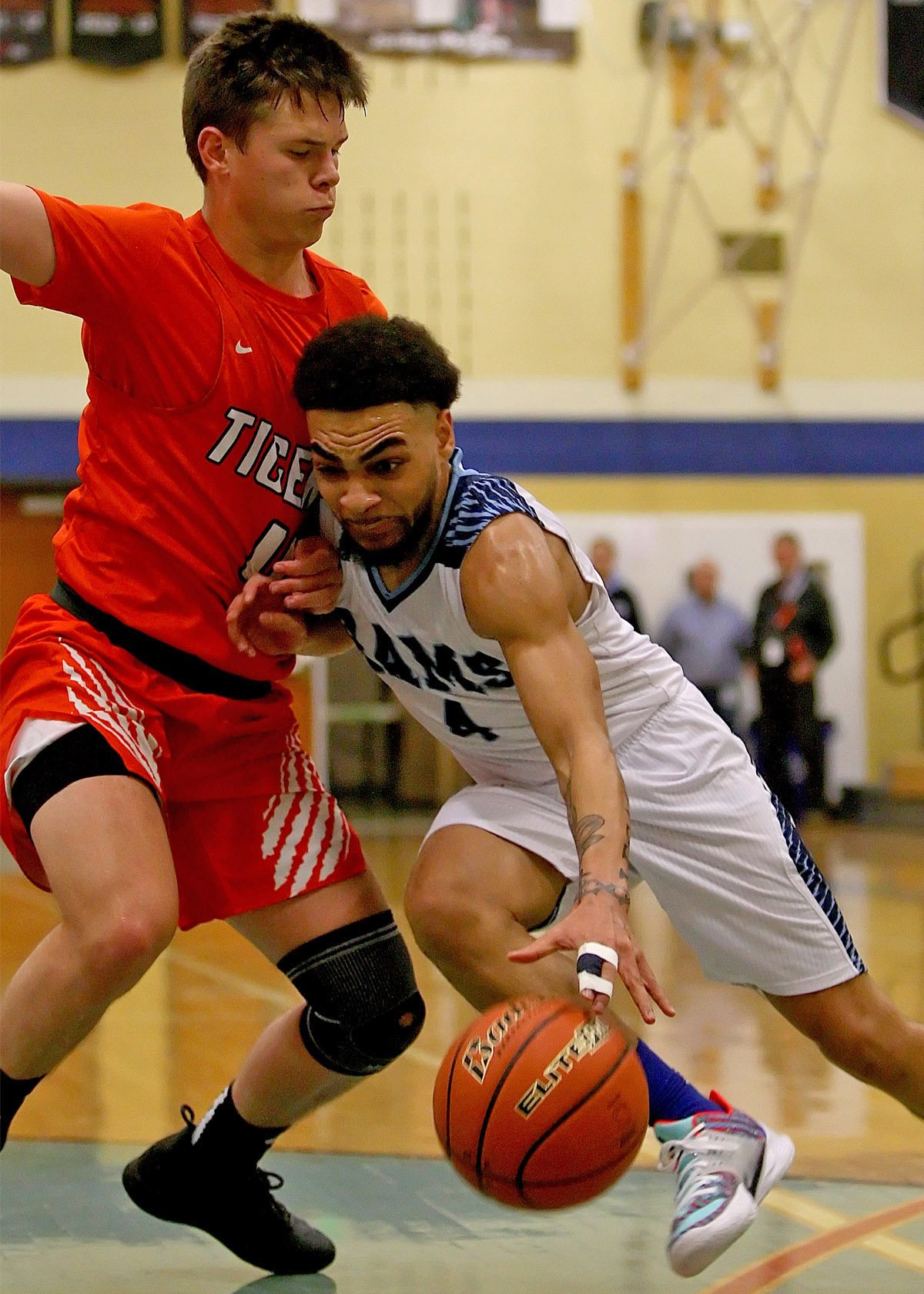 Ricky Bell III of Mt Rainier is fouled by Battle Ground's Cole Billingsley.