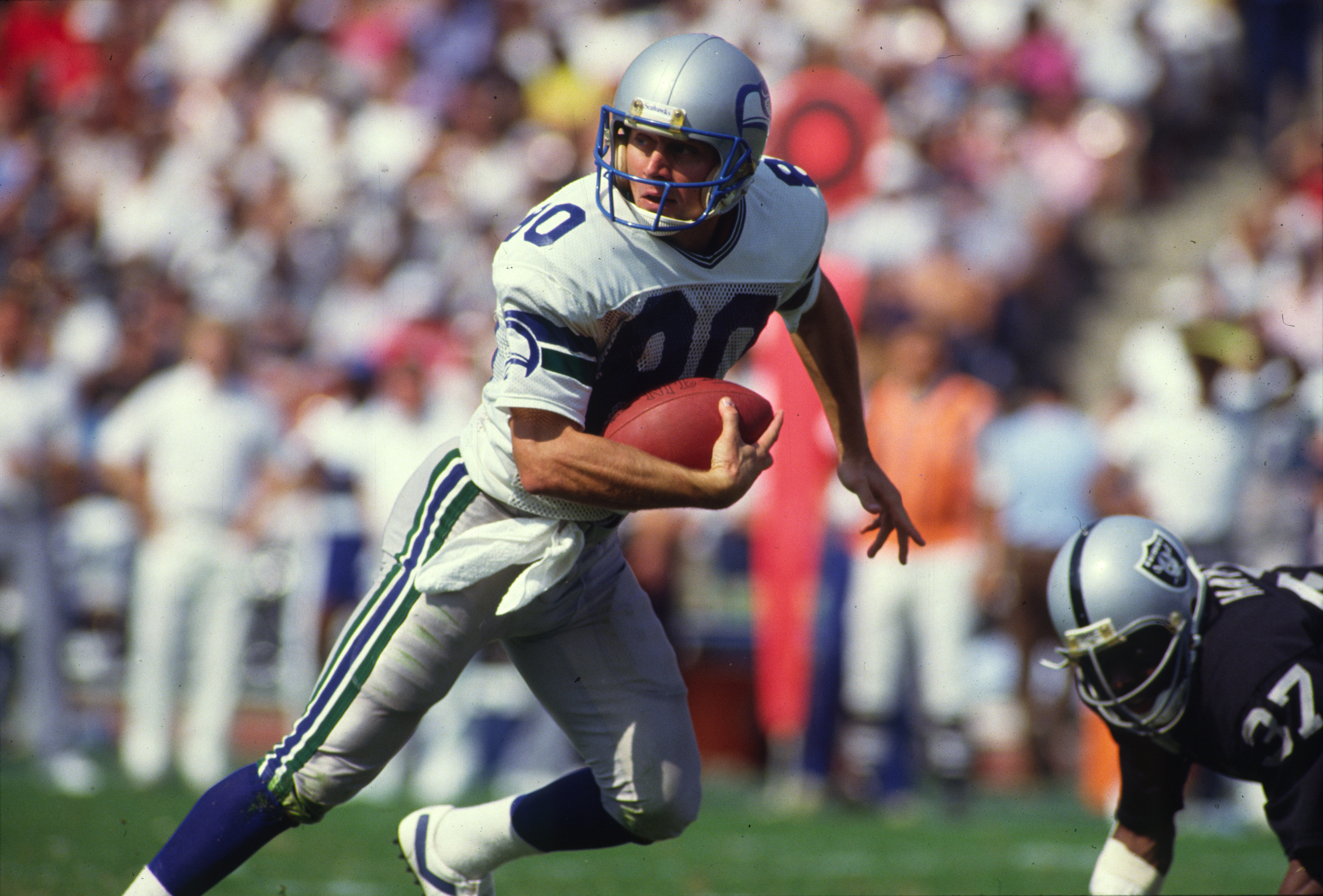 Largent runs after catch