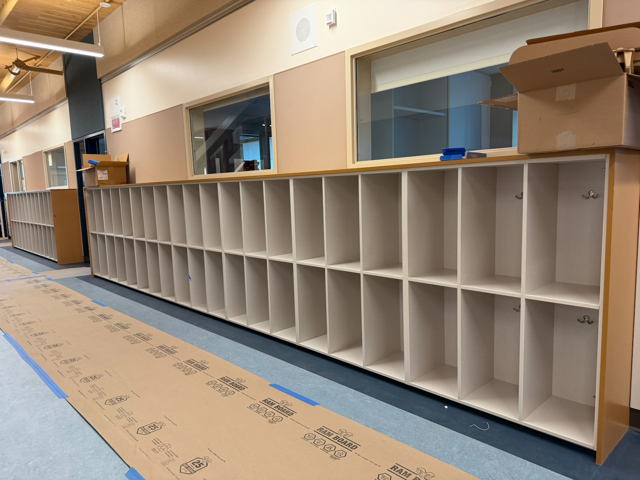 Cubbies line the hallway walls