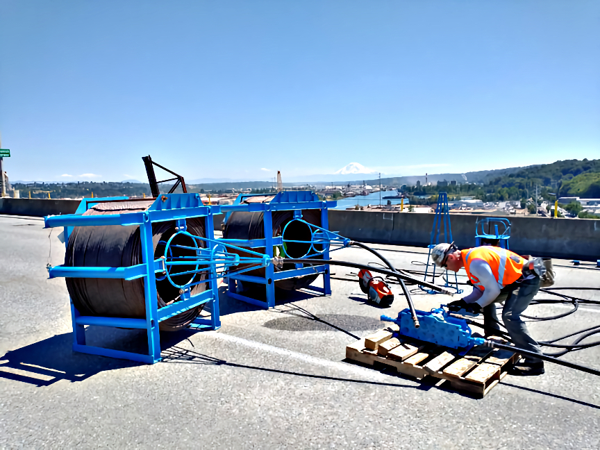 Steel cable is installed through protective ducts as part of the West Seattle Bridge’s newest post-tensioning system.