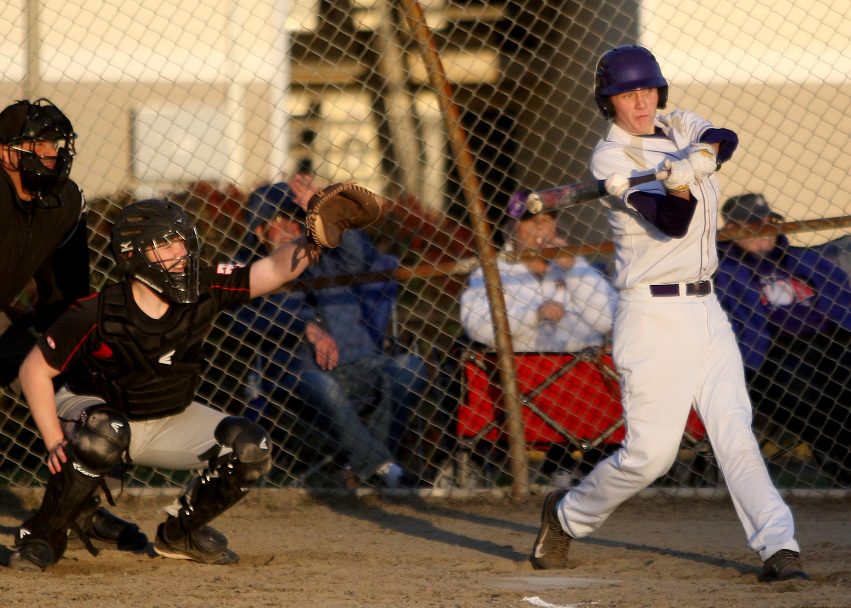 David Perkins of Highline gets his bat on the ball.