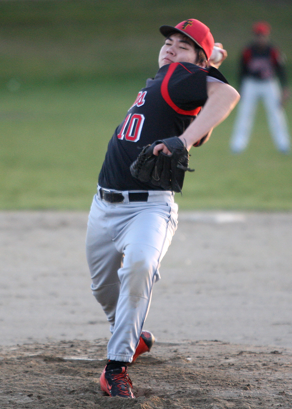 Nolan Park of Tyee sends his pitch to the plate.