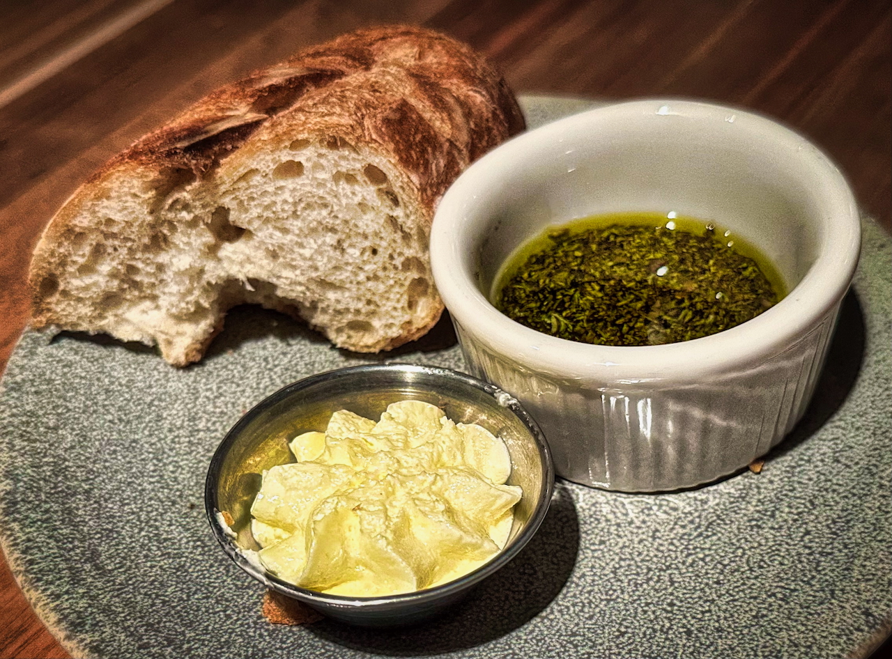 Macrina bread assortment, whipped butter, herb balsamic oil