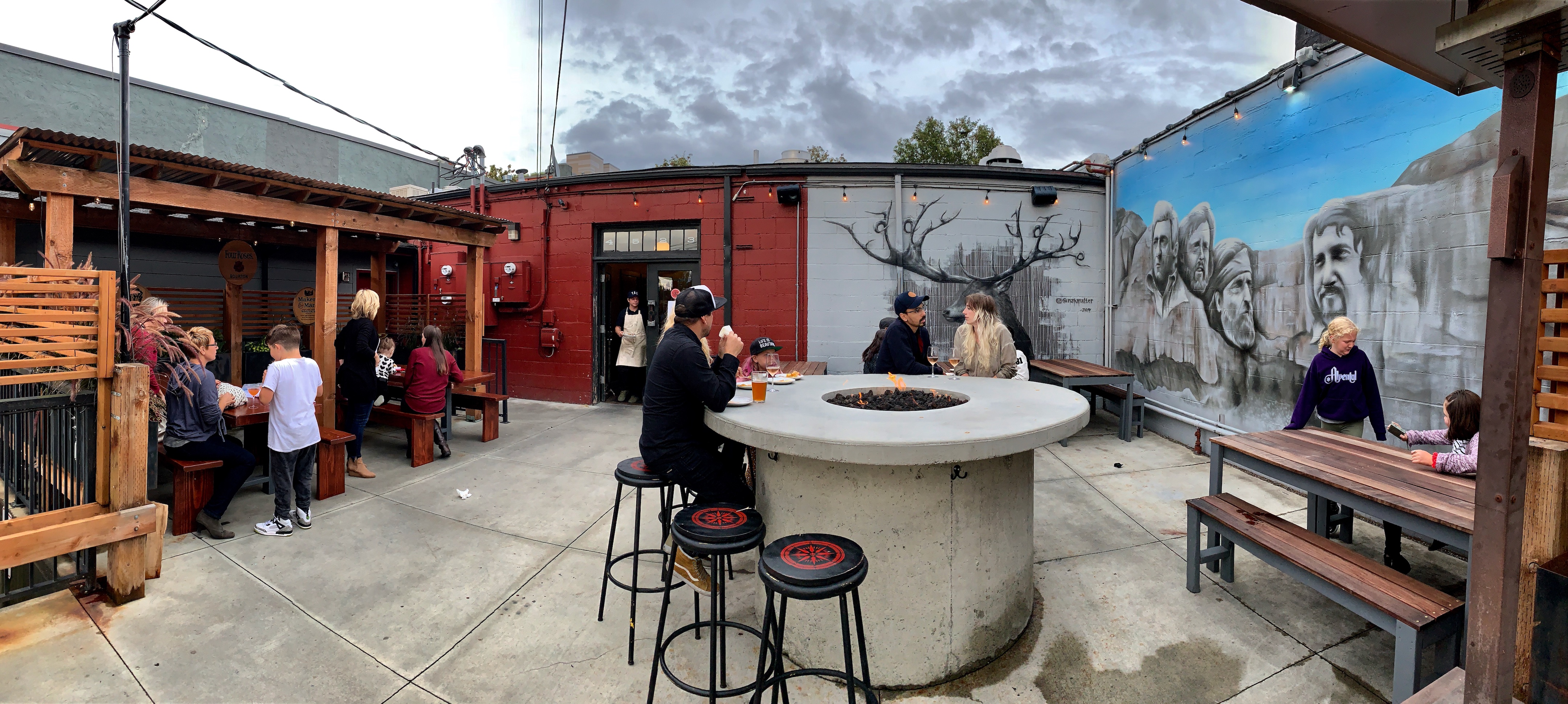 Lady Jaye patio features covered seating and a fire pit. Photo by Patrick Robinson