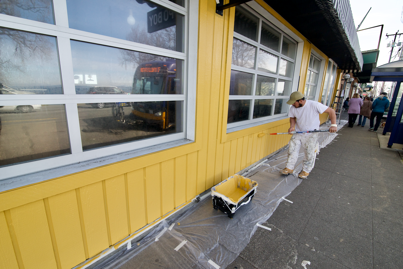 Painting the exterior at Alki Chicken and Waffles