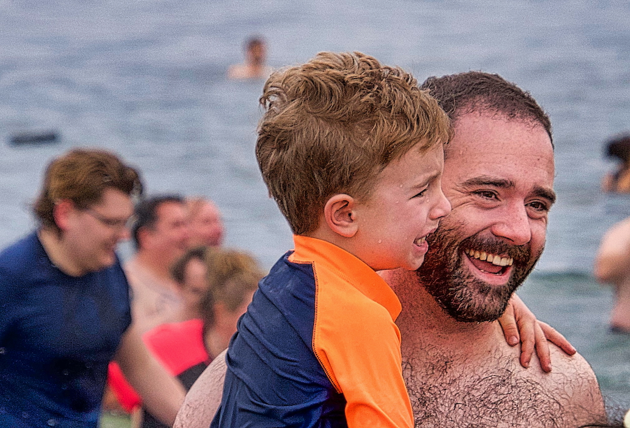 crying boy with dad