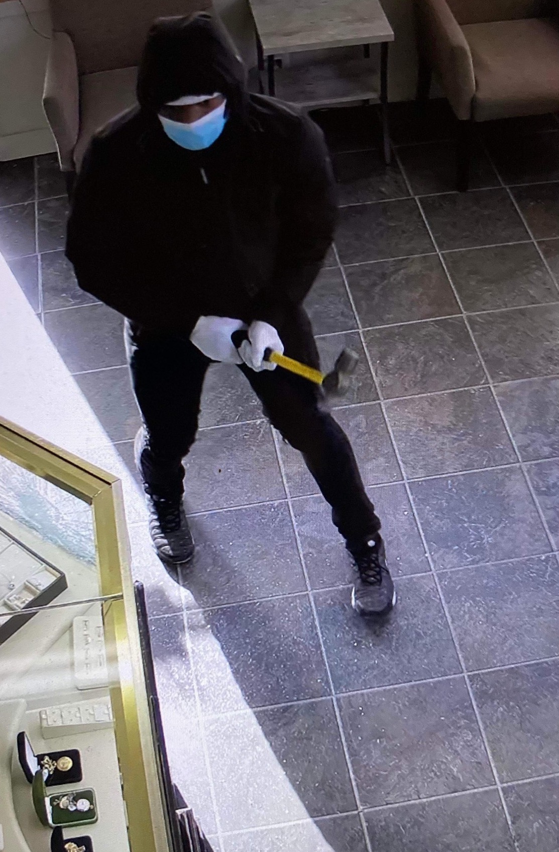 suspect with hammer