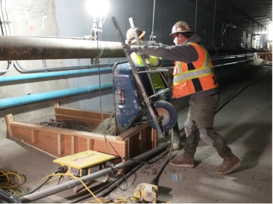 pouring concrete inside the bridge