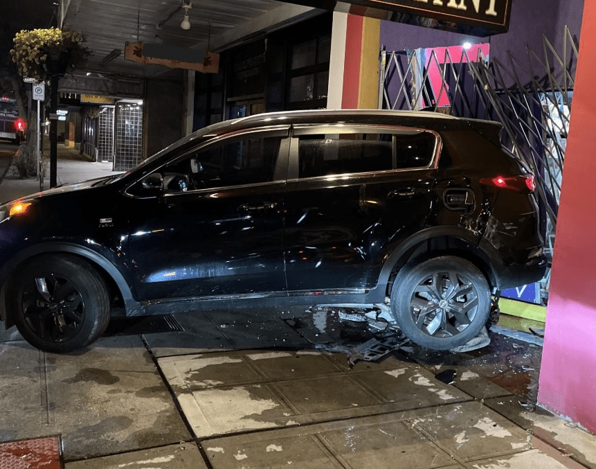 black kia at West Seattle Smoke shop