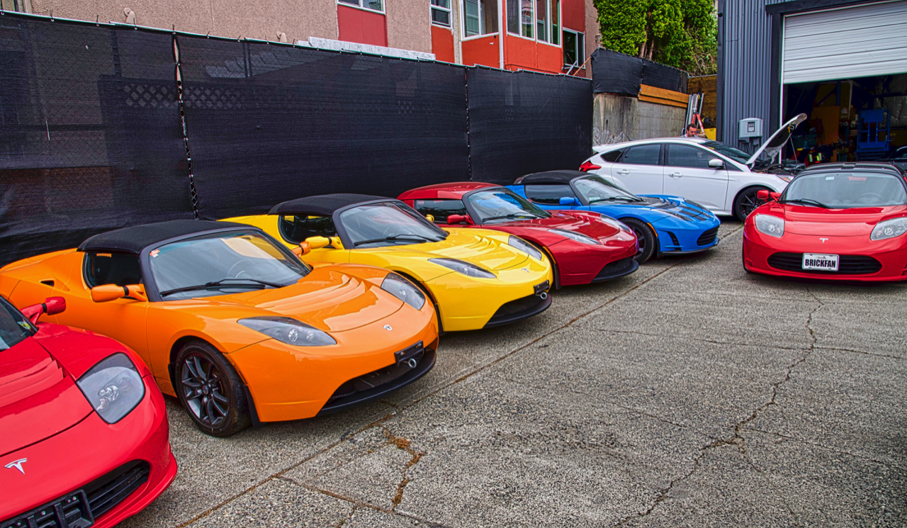 tesla roadsters outside