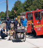 kidWithFiremen.jpg
