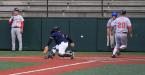 Errant thow home allows run to score.JPG