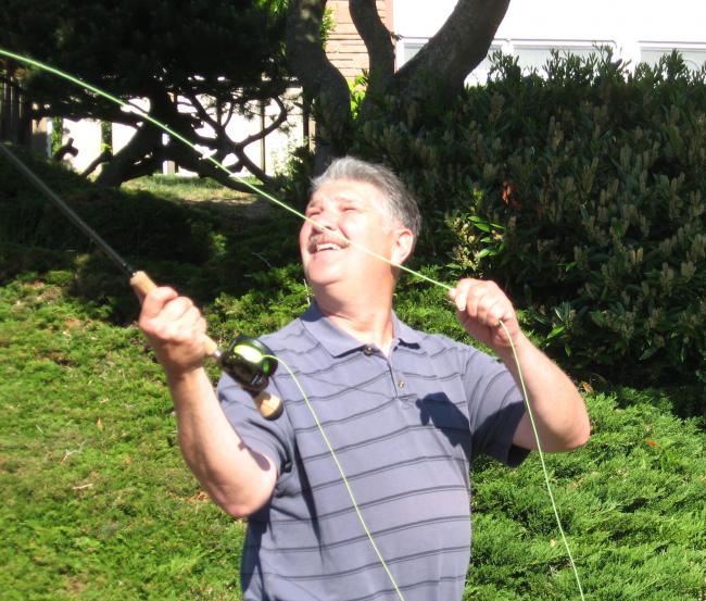 John Olson casts into the sun.jpg