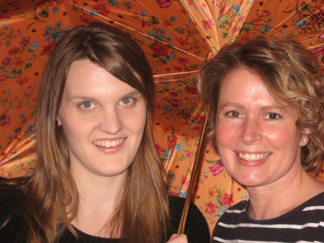Natalie Cordova and Jodell Egbert under just one umbrella.jpg